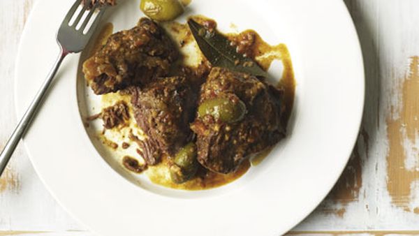 Spanish braised beef cheeks with tomato bread, parsley and anchovy salad