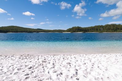 Bright White Sand of Lake McKenzie, a fresh water lake on Fraser Island.