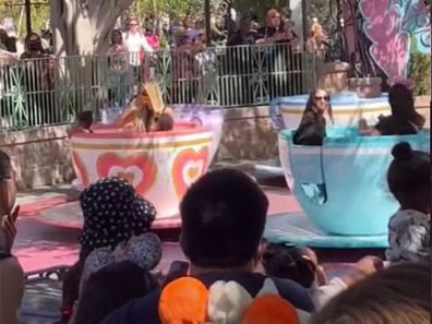 Khloe Kardashian takes her daughter True for a spin on the Teacup rides at Disneyland.