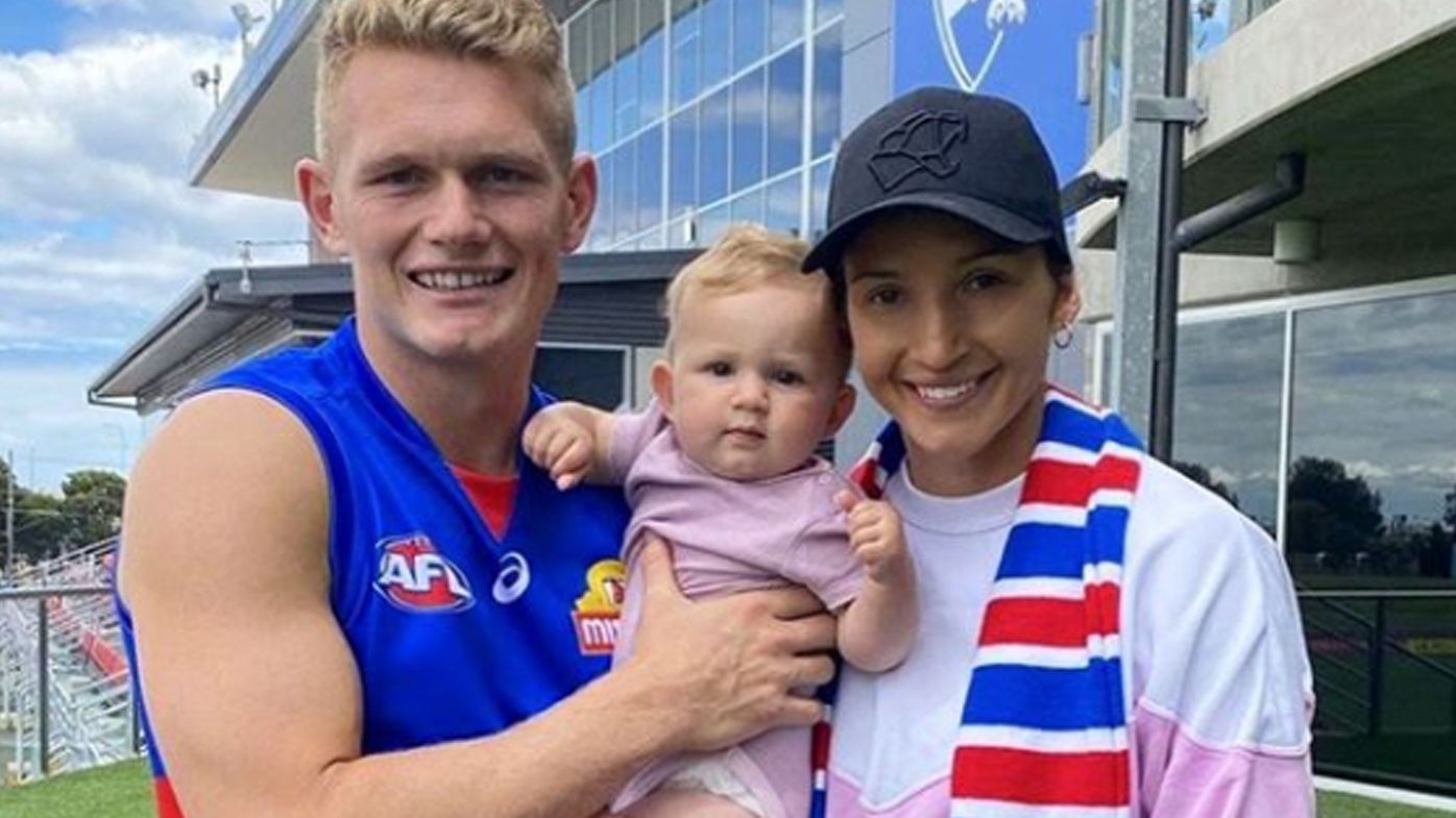 Treloar with his partner and daughter