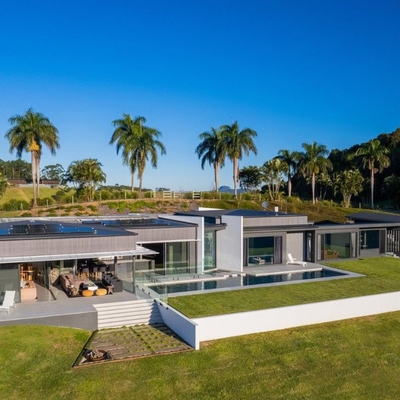 ‘Magical’ home with glass garage listed in Sunshine Coast hinterland