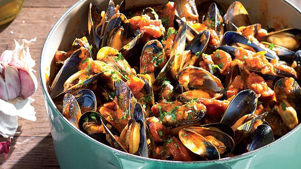 Mussels and chorizo with tomato ragout on garlic toast