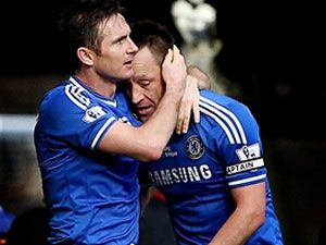 John Terry (R) is congratulated by Frank Lampard after scoring. (Getty)
