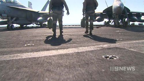 The ship is like a floating city, and a flying combat mission is a typical day at work. (9NEWS)