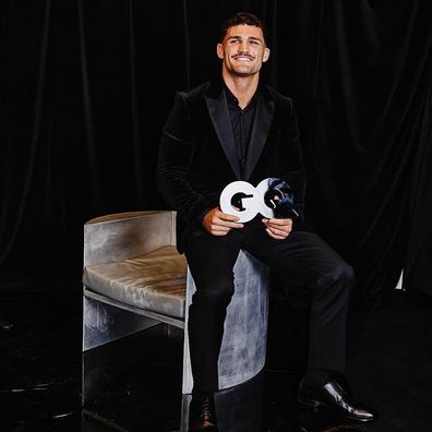 Cleary posing with his GQ award
