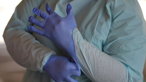 Health staff conduct tests at the COVID-19 testing centre in the Reactivating the Repat Hospital on March 11, 2020 in Adelaide.