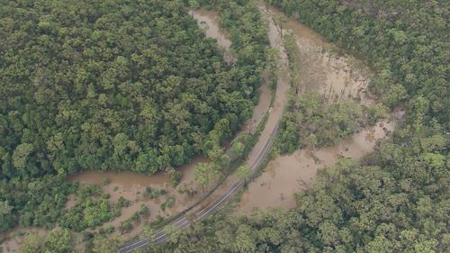 Part of the Wakehurst Parkway on Sydney's Northern Beaches is closed due to flooding.