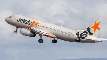 This image is of a Jetstar Airbus A320 departing Brisbane International Airport runway 19L. Jetstar Airways Pty Ltd, operating as Jetstar, is an Australian low-cost airline (self-described as &quot;value-based&quot;) headquartered in Melbourne. It is a wholly owned subsidiary of Qantas, created in response to the threat posed by airline Virgin Blue. Jetstar is part of Qantas&#x27; two brand strategy of having Qantas Airways for the premium full-service market and Jetstar for the low-cost market. Jetstar carrie