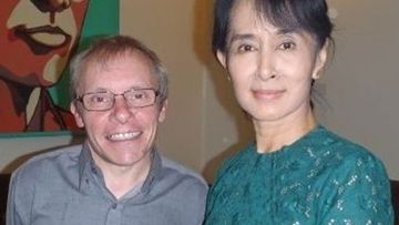 Sean Turnell and Aung San Suu Kyi in his LinkedIn bio photo