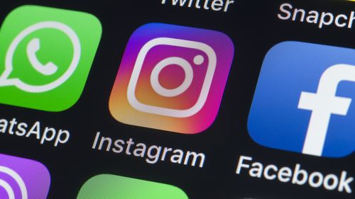 London, UK - July 24, 2018: The buttons of WhatsApp, Instagram, facebook, Twitter, Snapchat and other apps on the screen of an iPhone.