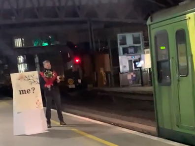 Man proposes as girlfriend drives train into station