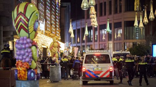 Dutch police block a shopping street after a stabbing incident in the centre of The Hague, Netherlands, Friday, Nov. 29, 2019.