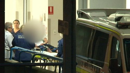 A young man was arrested after two women were stabbed in a Sydney home. (9NEWS)