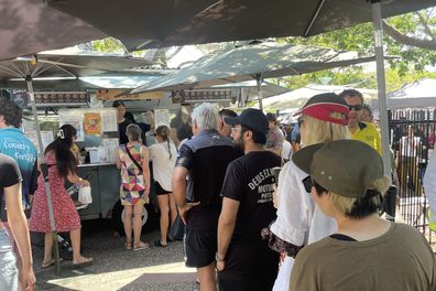 People lining up at a food truck at Parap Market in Darwin