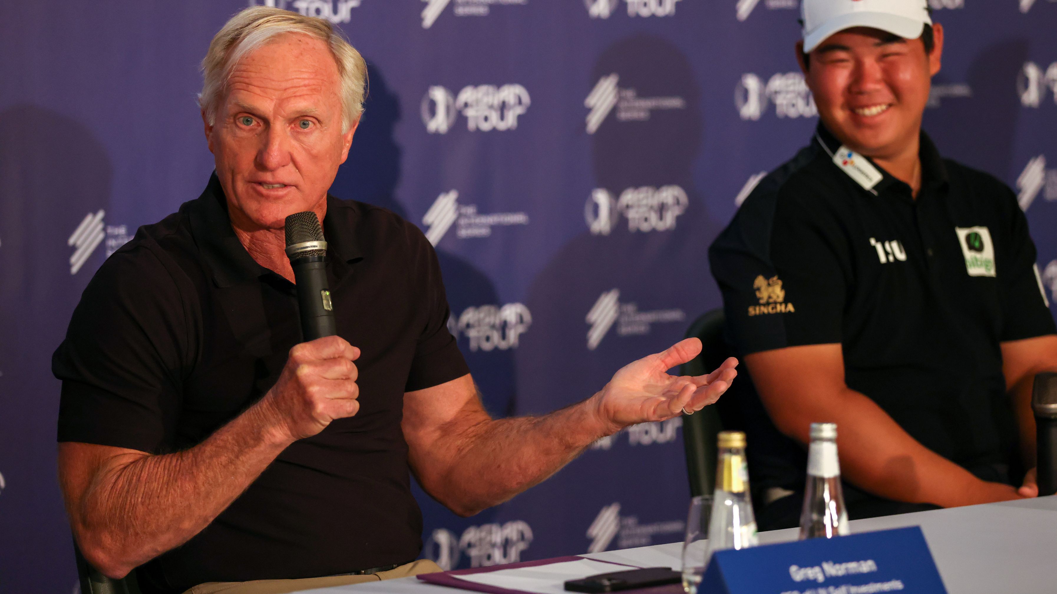 Greg Norman, CEO of Liv Golf Investments and Kim Joo-hyung of South Korea during a press conference.