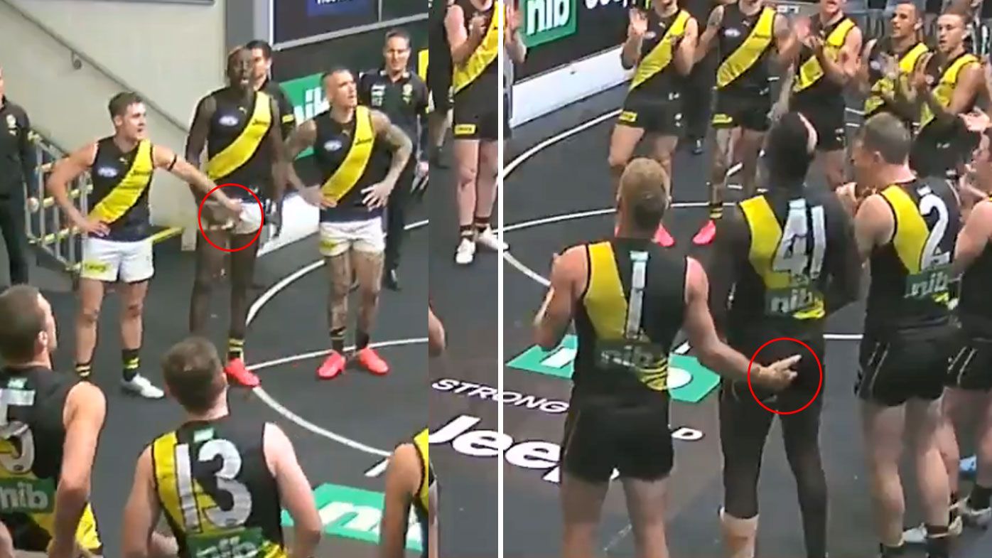 Richmond duo apologise to teammate Mabior Chol after bizarre footage of post-match change room antics