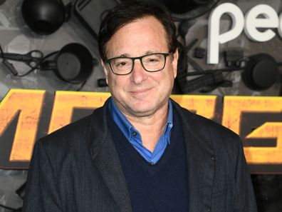 Bob Saget attends the red carpet premiere & party for Peacock's new comedy series "MacGruber" at California Science Center on December 08, 2021 in Los Angeles, California. 