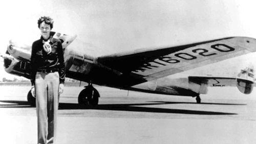 Amelia Earhart stands next to a Lockheed Electra 10E, not long before her last flight. (AP)