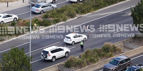 Police arrested a man after  an allegedly stolen vehicle crashed into other cars near the entrance to the Burnley Tunnel.