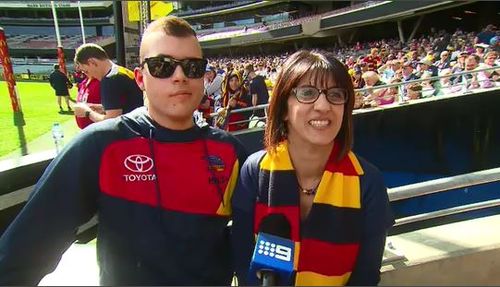 Die-hard Crows supporters, Christian and Mim Lopreti. (9NEWS)