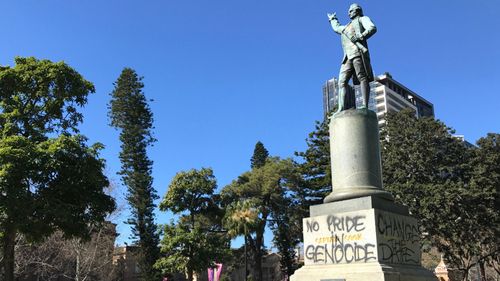 This statue of Captain James Cook was sprayed with slogans in 2017, in protest of Australia day.