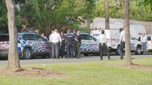 A strong police presence remains outside the Arana Hills home.