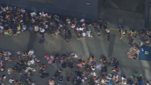 Huge queues form at Melbourne's Marvel Stadium for Harry Styles concert.