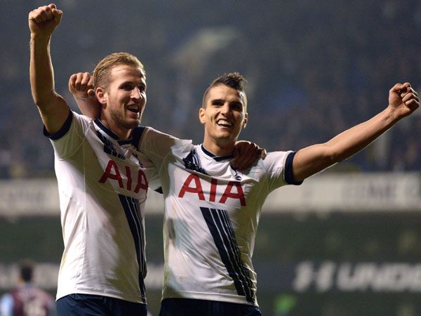 Tottenham Hotspur's goalscorer Harry Kane (left) and Erik Lamela (right) celebrate the third goal. (AAP)