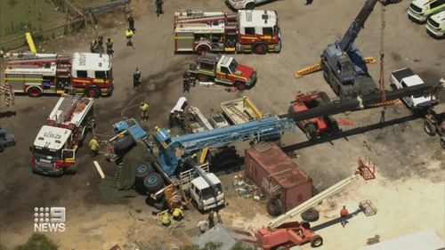A 37-year-old man has been seriously hurt after becoming trapped inside a 100-tonne crane as it tipped in Perth's north.
It took a mammoth two hour rescue mission to save the operator whose legs were crushed.