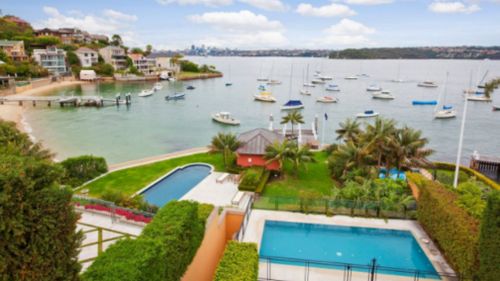 Set on 1940 square metres, it also has a swimming pool, boatshed and private jetty. (Domain)
