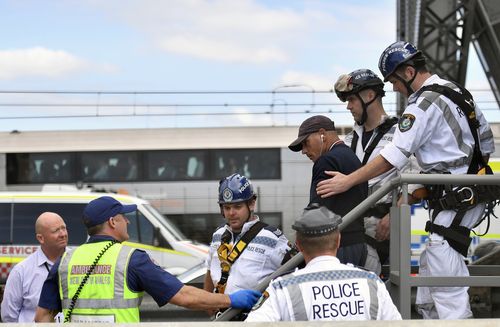 After he was arrested, he attempted to grab a police officer's gun while under police guard in hospital. Picture: AAP