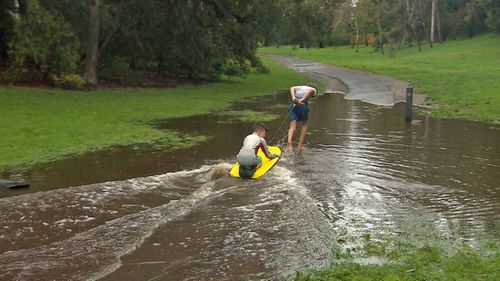 The rain didn't keep everyone indoors, turning parks into a playground for kids