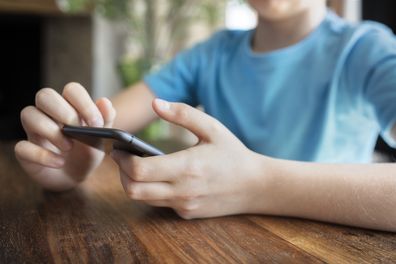 boy using phone