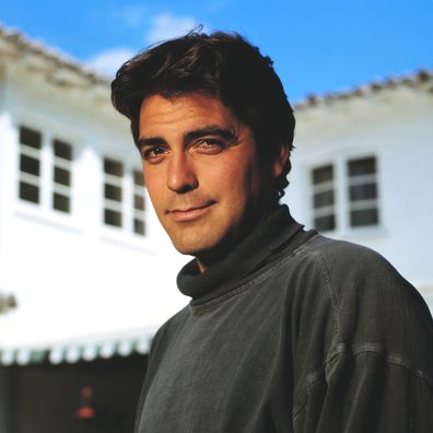 Actor George Clooney poses in grey turtleneck shirt. (Photo by  Tim Rue/CORBIS/Corbis via Getty Images)