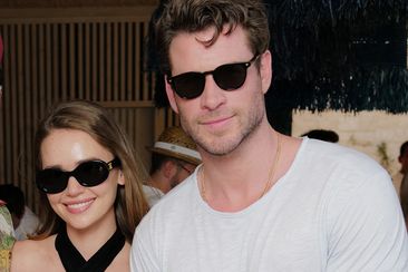 ATHENS, GREECE - JUNE 08: (R-L) Liam Hemsworth, Gabriella Brooks and Luke Evans attend the Balmain Brunch &amp; Pool Party hosted by Olivier Rousteing, Creative Director of Balmain, to unveil the special summer collaboration during the One&amp;Only Aesthesis Grand Opening Party, on June 08, 2024 in Athens, Greece. (Photo by Darren Gerrish/Getty Images for One&amp;Only)