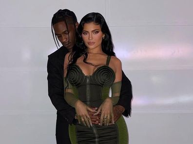 Travis Scott and Kylie Jenner post for cosy photo on Instagram.