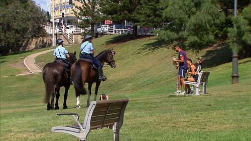 Mounted police move people on at Bondi.