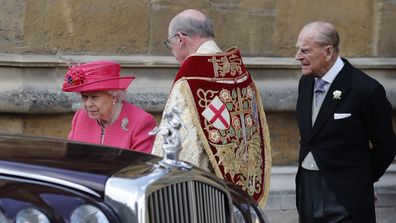 Queen Elizabeth II and Prince Philip leave the chapel after the wedding of Lady Gabriella Windsor.