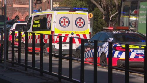 Emergency services rushed to Devï»¿onshire Street in Surry Hills before 1.30pm.