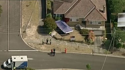 Neighbour investigated after intruder killed at Melbourne home