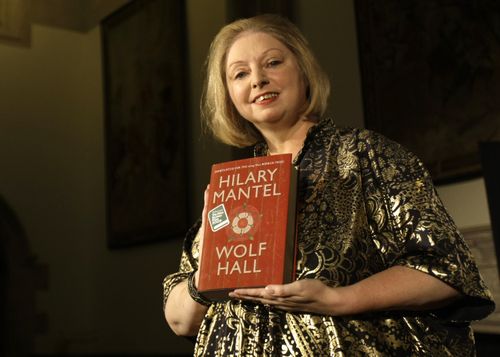 Winner of the 2009 Booker Prize for fiction Hilary Mantel with their book ' Wolf Hall ' poses for photographers following the announcement in central London, on October 6, 2009. 