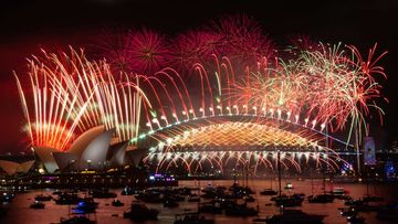 Fireworks light up the skies above Sydney Harbour at midnight on New Year&#x27;s Eve. 31st December 2022 