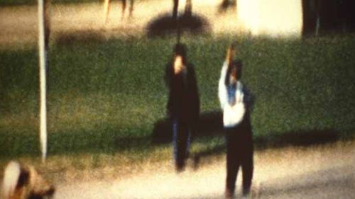 The 'umbrella man', identified as Louie Steven Witt, is a name given to a figure who appears in the Zapruder film, near the Stemmons Freeway sign within Dealey Plaza during the assassination of John F. Kennedy.