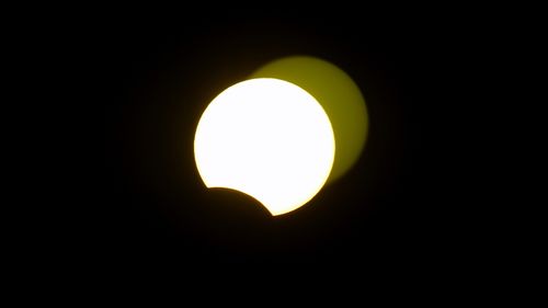 The solar eclipse is seen from Jiddah, Saudi Arabia.