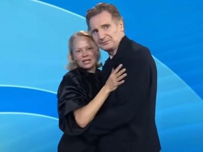 Pamela Anderson and Liam Neeson stage a kiss on the US Today Show