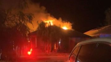 A father has died after a fire tore through a home in Alkimos, north of Perth.