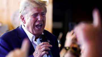 Republican presidential candidate and former US President Donald Trump speaks as he campaigns at the Iowa State Fair in Des Moines, Iowa, on August 12, 2023. 