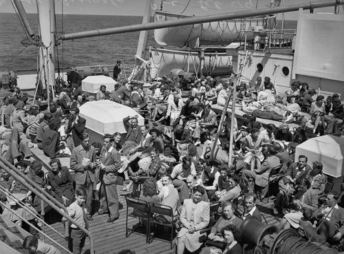 Migrants from the UK on the deck of the Georgic, bound for Australia, in 1949.