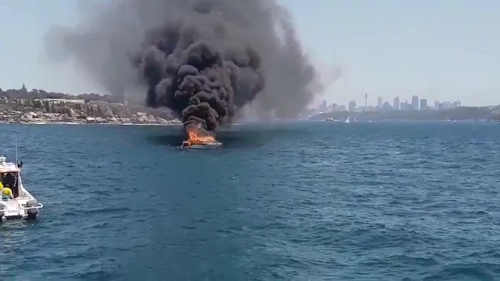 A luxury cruiser has erupted in flames off Watson's Bay near the entrance to Sydney Harbour.