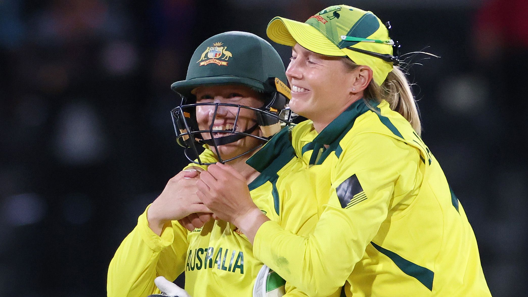 Alyssa Healy and Meg Lanning celebrate Australia&#x27;s victory in the 2022 ICC Women&#x27;s Cricket World Cup final.